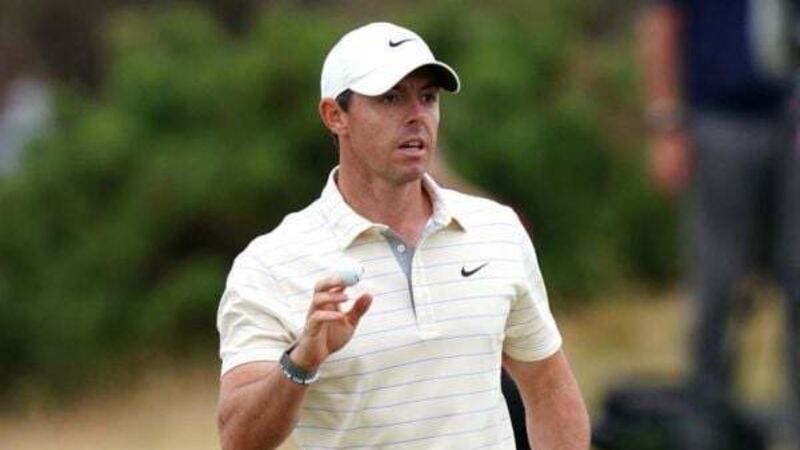 Rory McIlroy finishes superbly to take share of lead with rival Patrick Reed