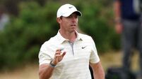 Rory McIlroy finishes superbly to take share of lead with rival Patrick Reed
