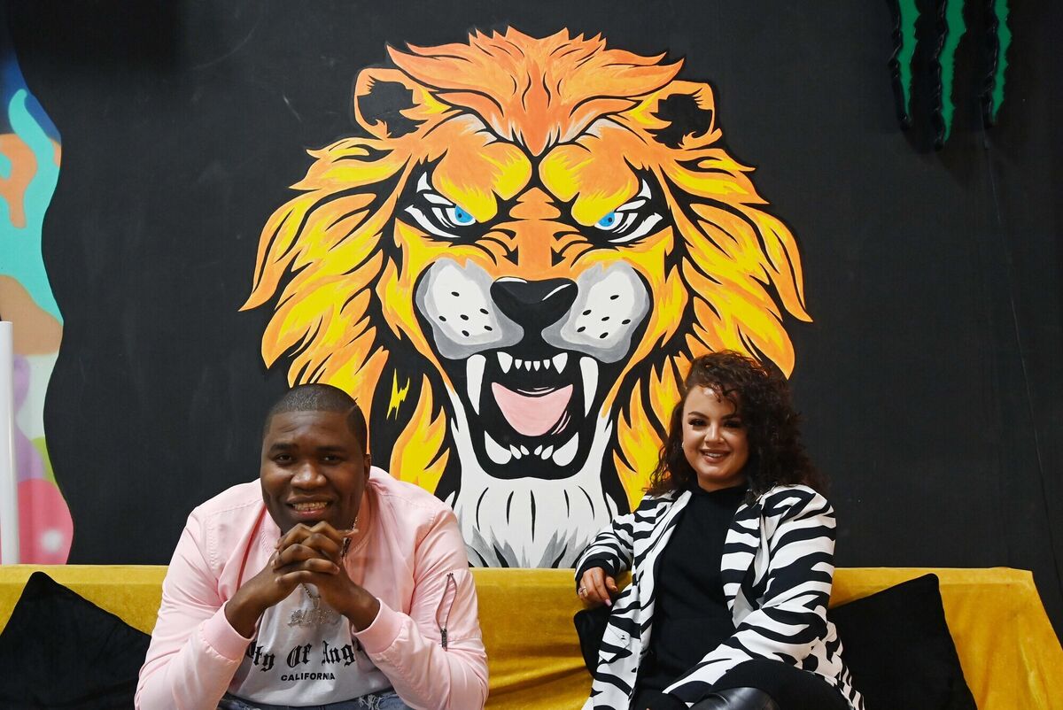 Gilberto Gomes and Chloe Gonzalez, co-directors, in front of their company logo for Banger Productions, pictured in the Kino, Cork. Picture Denis Minihane.