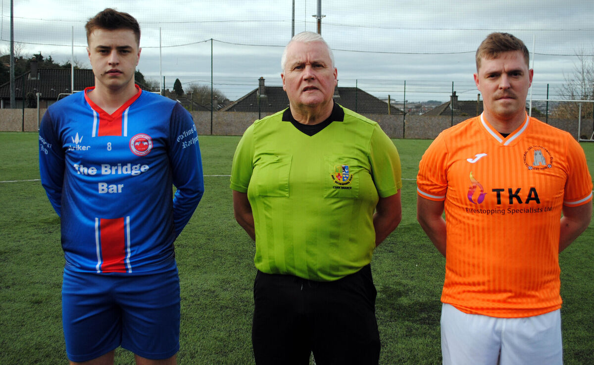 Cathedral Celtic's captain Johnnie O'Sullivan (right) with Rathcoole Rovers' Brian O'Keeffe, accompanied by referee Jim Hennessy. Picture: Barry Peelo.