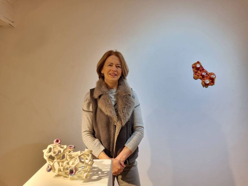 ECHO FEaTuRES Bernie Hennessy with her work at the Lavit Gallery.