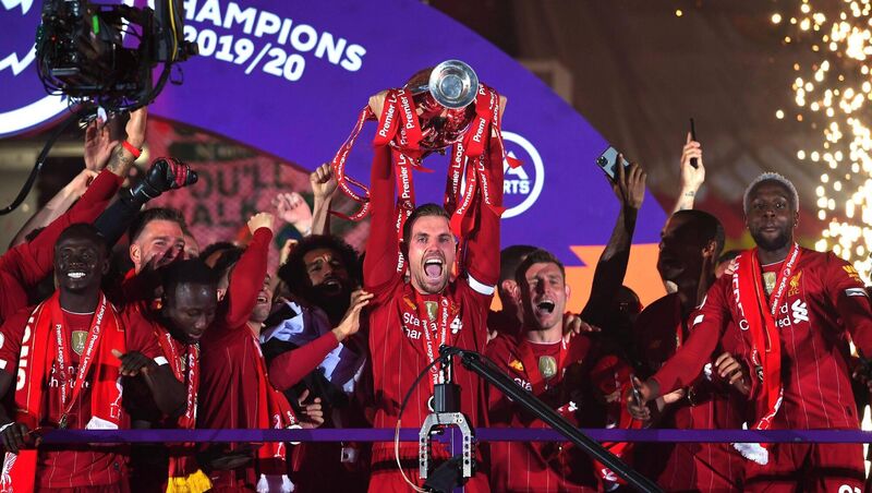 Jordan Henderson of Liverpool lifts The Premier League trophy at Anfield on July 22, 2020. Man City denied them a title on three other occasions in recent years. Picture: Laurence Griffiths/Getty Images