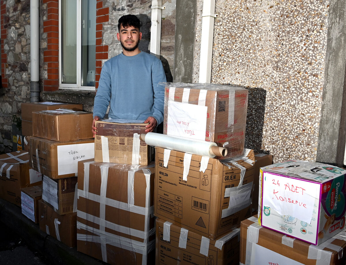 Firat Uygun, helping to load the vans with supplies for the Turkish victims Picture; Eddie O'Hare Firat Uygun, helping to load the vans with supplies for the Turkish victims Picture; Eddie O'Hare