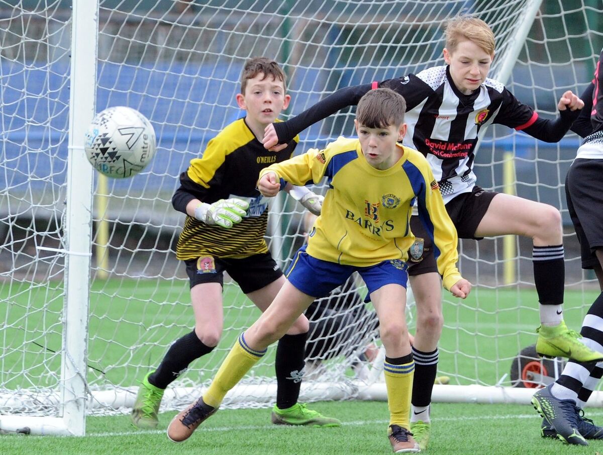 Douglas Hall's Dawid Jozefowski and Midleton's Lorcan Evans looking to win the ball in the Blackwater Motors Under 12 Premier game at Moneygourney. Douglas Hall's Dawid Jozefowski and Midleton's Lorcan Evans looking to win the ball in the Blackwater Motors Under 12 Premier game at Moneygourney.