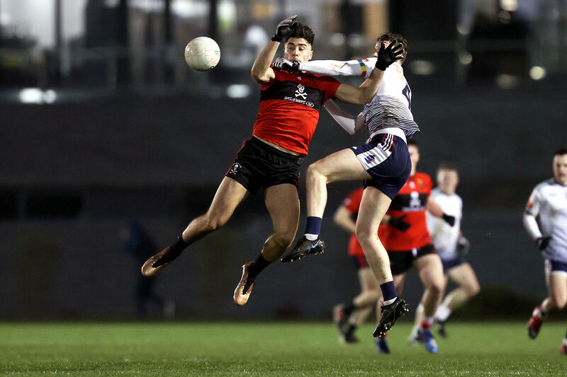 UCC’s Shane Merritt and Daniel Walsh of the University of Limerick battle for a kick-out. Picture: INPHO/Laszlo Gezo