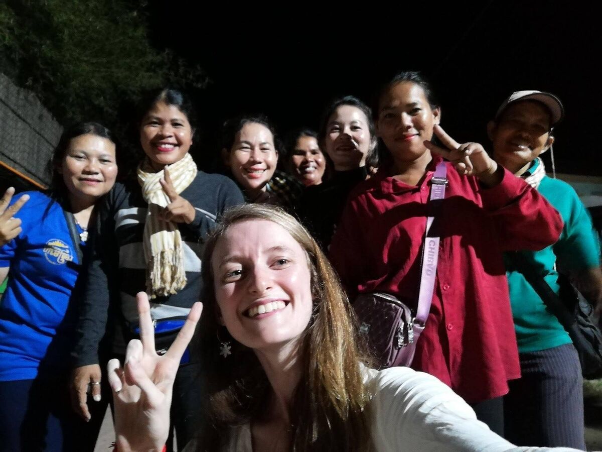 Jenny Byrne with a group of female tuk tuk drivers who are a part of Driver Srey, a group of female drivers in Siem Reap. 