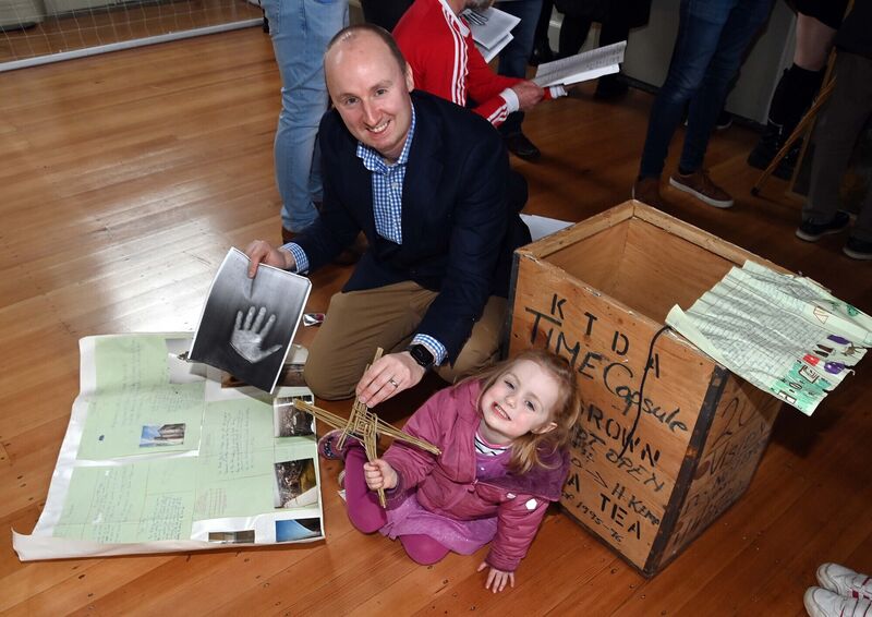 Patrick O'Driscoll with his daughter Kate looking through the memorabilia from a time capsule from 1995-1996 which was opened by the former sixth class pupils from the time and family members and Herman Kemp, who was the sixth class teacher then, at North Monastery Primary School, Cork. Patrick O'Driscoll with his daughter Kate looking through the memorabilia from a time capsule from 1995-1996 which was opened by the former sixth class pupils from the time and family members and Herman Kemp, who was the sixth class teacher then, at North Monastery Primary School, Cork.