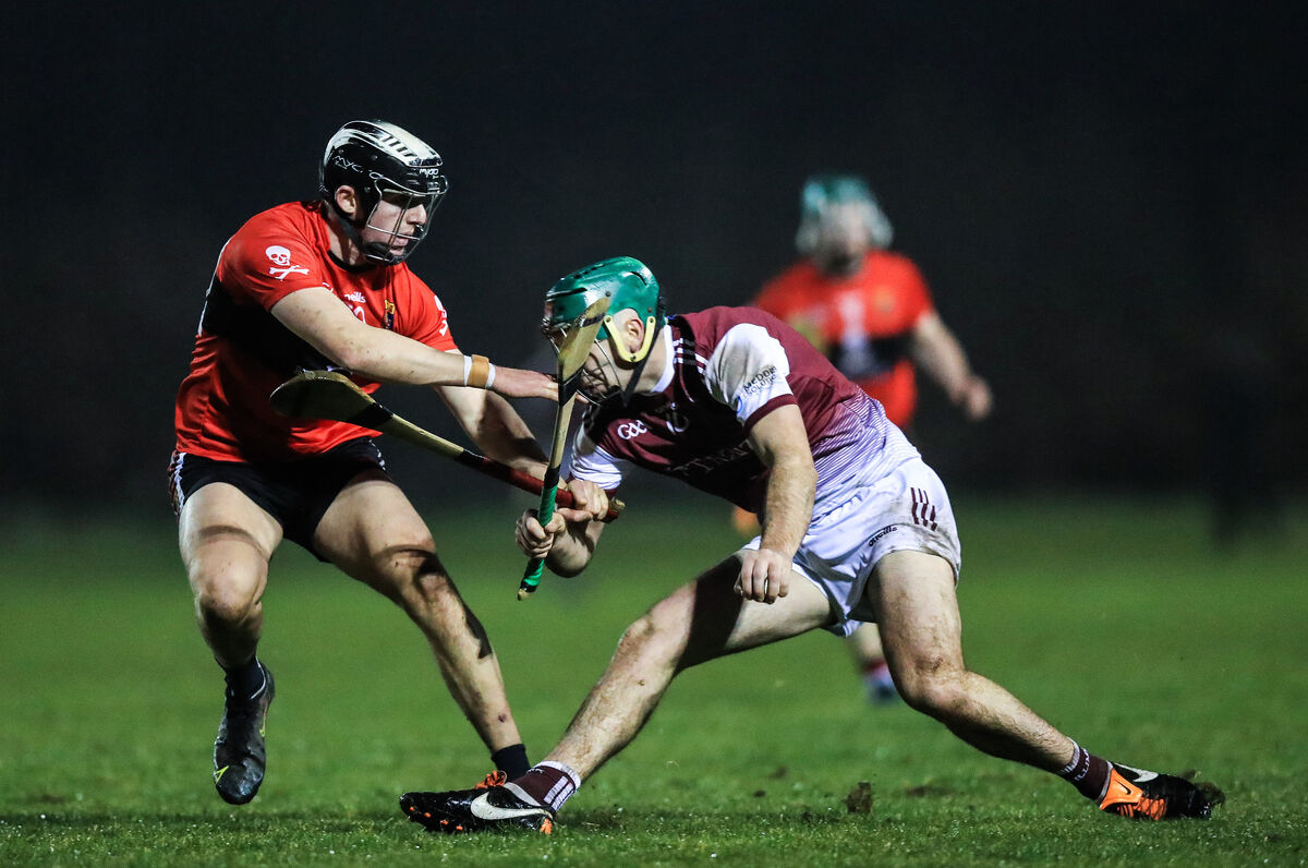 University of Galway’s Brian Concannon tackled by Ger Millerick of UCC. Picture: INPHO/Evan Treacy
