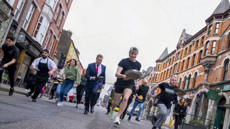 Oisín 'batters' opposition in pancake race
