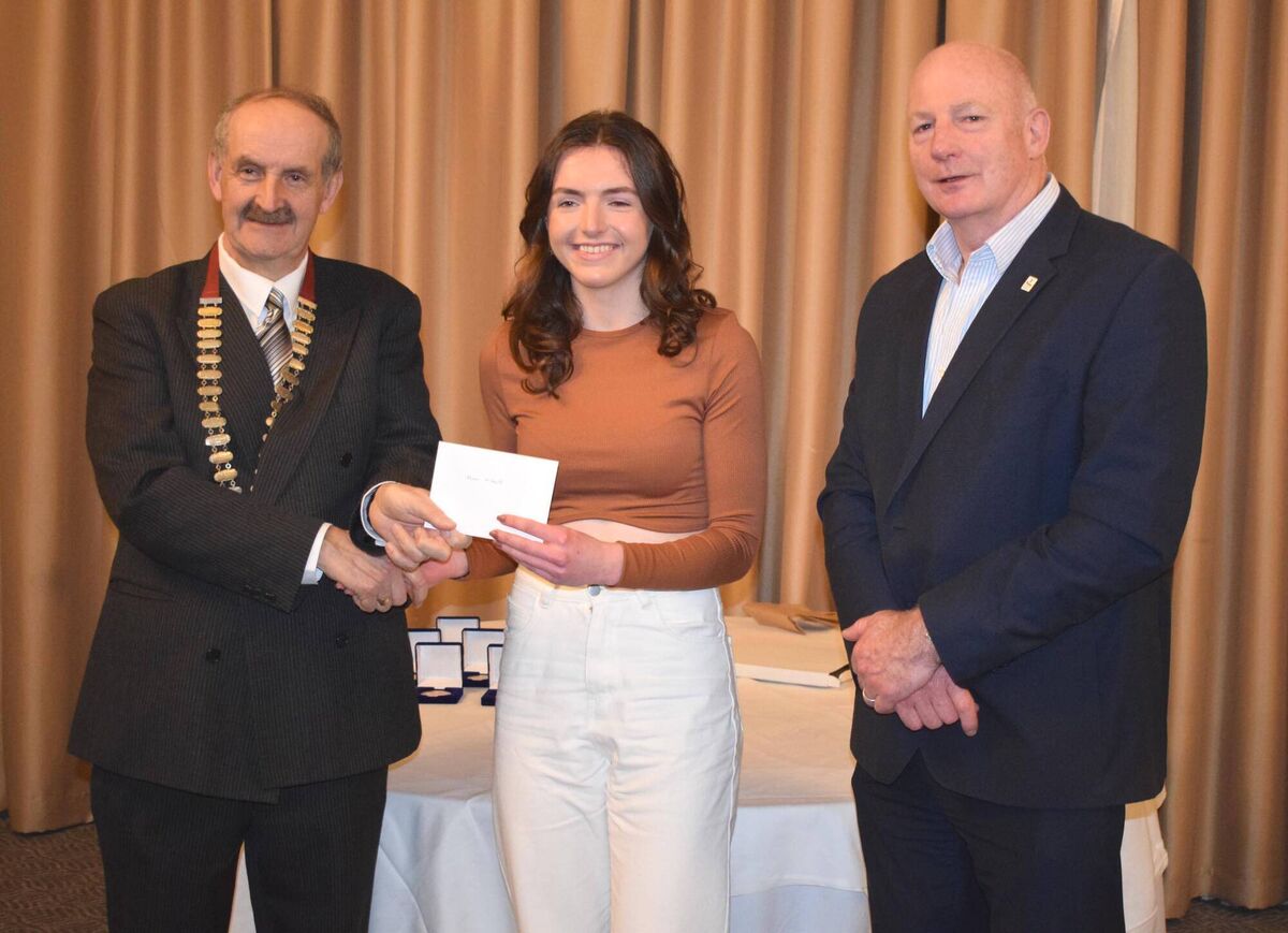 Maeve O'Neill of Doheny Athletic Club receiving her Aspiring Young Athlete grant from Pat Walsh, Chairman, Cork Athletics. Also pictured is Hamish Adams, CEO of Athletics Ireland. Picture: John Walshe Maeve O'Neill of Doheny Athletic Club receiving her Aspiring Young Athlete grant from Pat Walsh, Chairman, Cork Athletics. Also pictured is Hamish Adams, CEO of Athletics Ireland. Picture: John Walshe