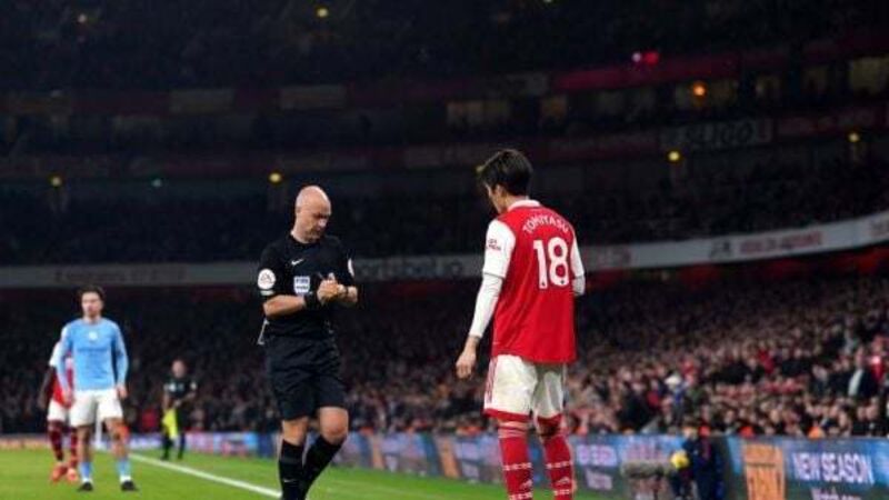 Arsenal and Man City fined for surrounding referee Anthony Taylor