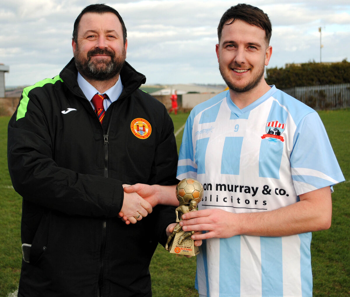Paul Pepper (Cork AUL) presents the man of the match award (Sponsored by Gary McCarthy Trophies) to Castleview's Daniel O'Donoghue. Picture: Barry Peelo.