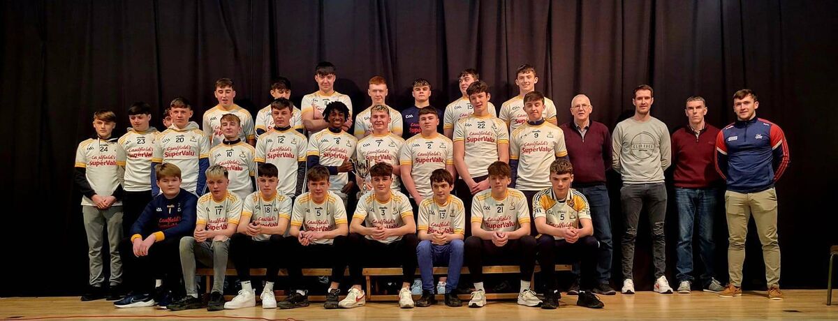 The Bandon minor hurling team who won the Division 1 hurling championship last season pictured with their coaches Martin Kelly, Colm Fogarty, Pat Barry and Cork senior player Niall O'Leary.