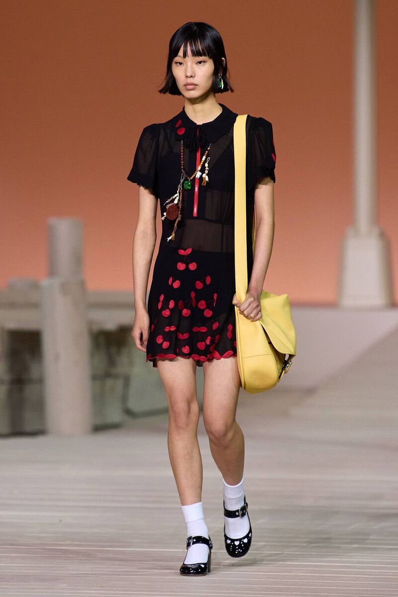 A model on the catwalk at Coach SS23. A model on the catwalk at Coach SS23.