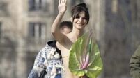 Emily Ratajkowski wears plant as a top at Paris Fashion Week