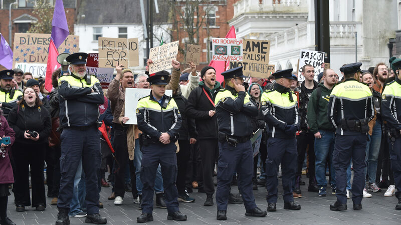 WATCH: Gardaí form barrier as demonstrators face off in Cork city centre WATCH: Gardaí form barrier as demonstrators face off in Cork city centre