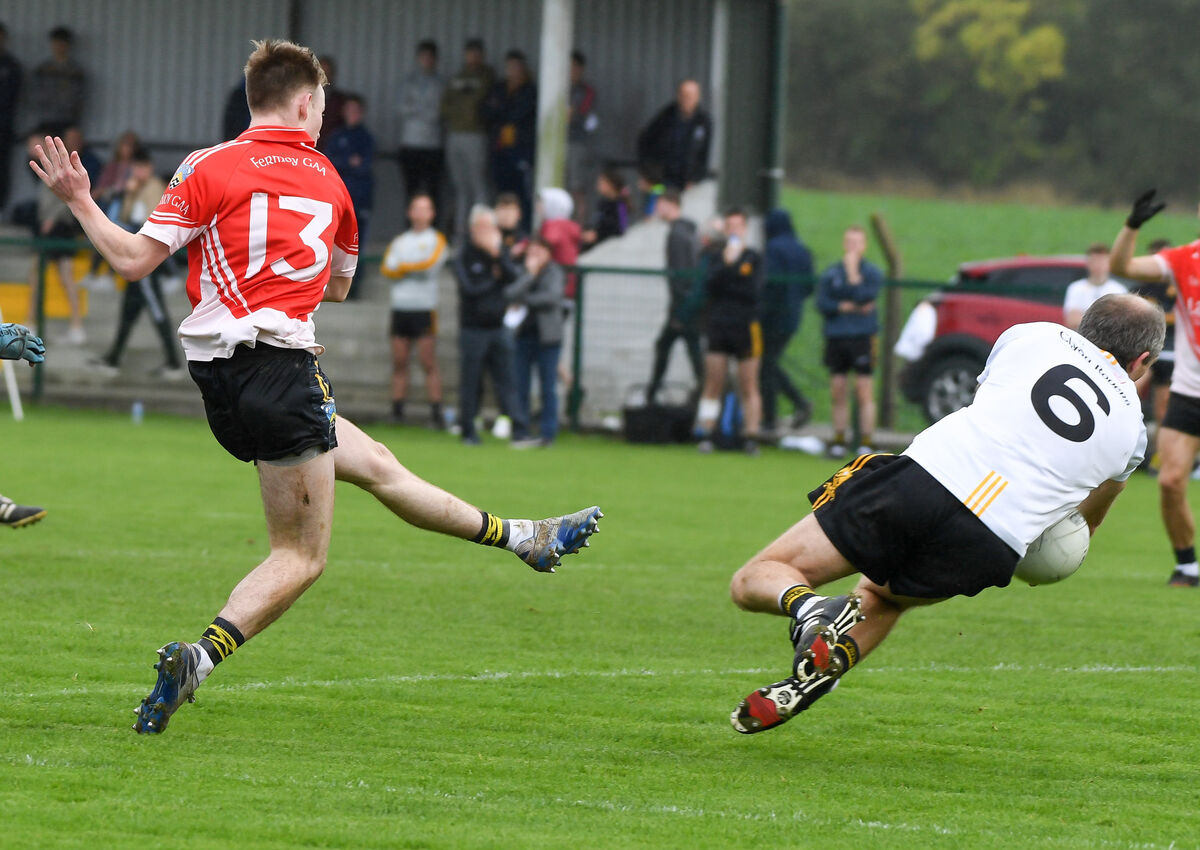  Clyda Rovers' Paudie Kissane makes a superb block to deny Fermoy's Ben Twomey. Kissane is now immersed in coaching. Picture: David Keane.