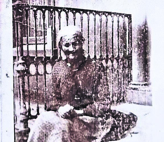 ENDURING MYSTERY: The woman sitting outside 9, North Mall. ENDURING MYSTERY: The woman sitting outside 9, North Mall.