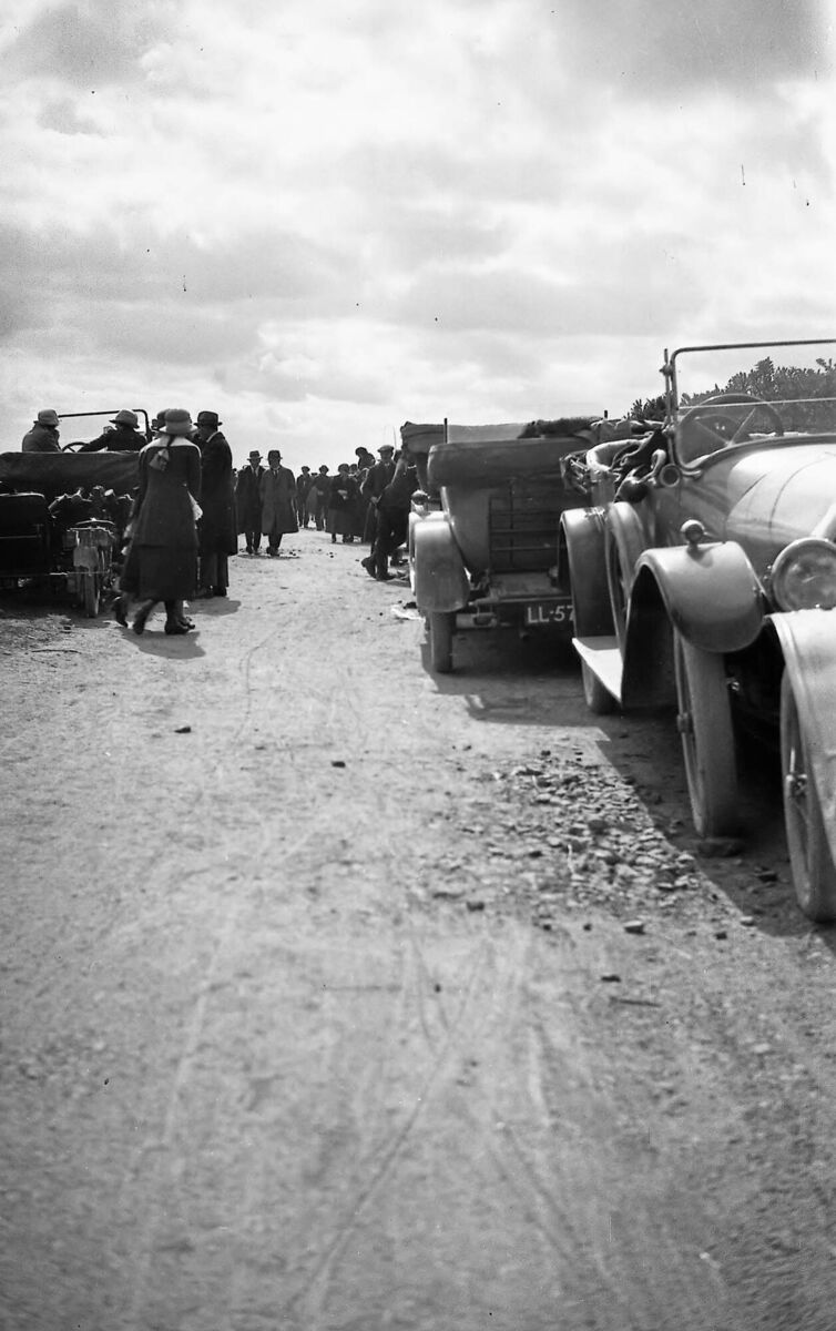 Johnson &amp; Perrott has announced its decision to donate its historical archive to the city with material dating back to 1861. Photo shows people going to an event. 