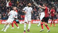 Liverpool pay the penalty as Bournemouth escape basement with shock victory