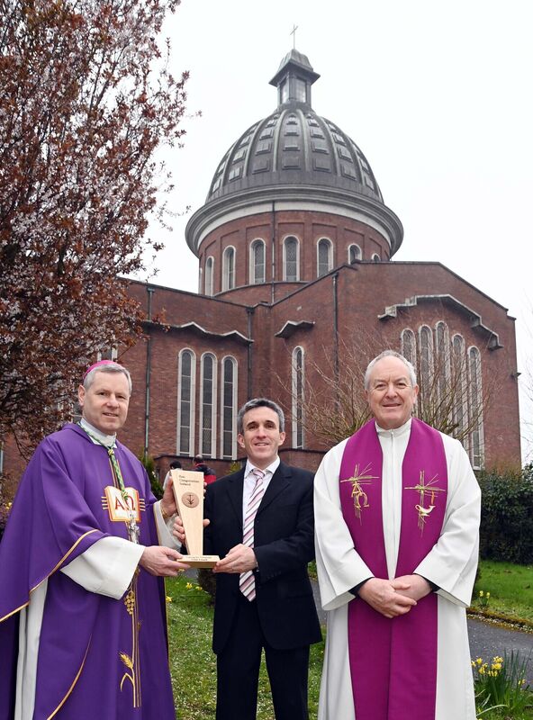 Bishop Fintan Gavin making the presentation, on behalf of Ecocongregation Ireland, of an Eco Gold Award to Ballineaspaig parish in recognition of its action for climate justice, to Eamonn Moynihan, chairperson, parish Pastoral Council, in the presence of Fr. Donal Cotter, P.P., following mass in the Church of the Descent of the Holy Spirit, Dennehy's Cross, Cork. Picture: Denis Minihane.