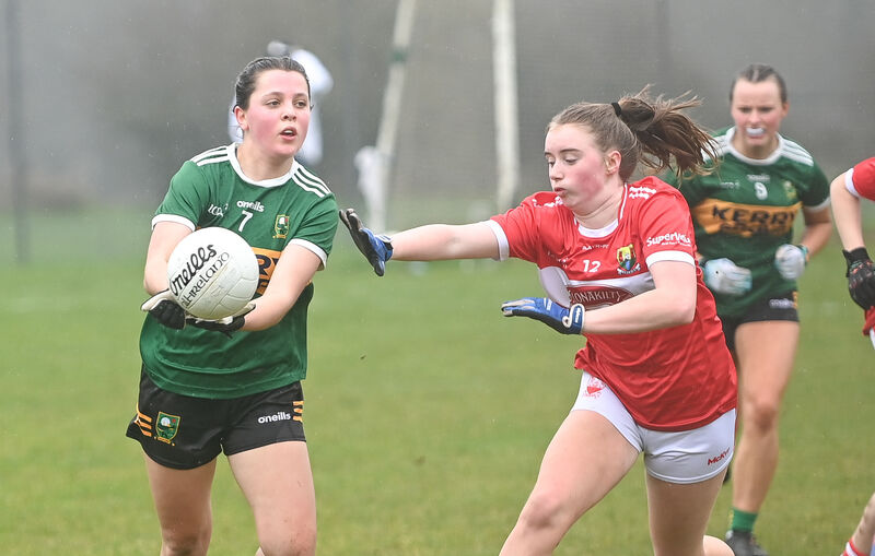 Cork's Ella Burns closes in to challenge Kerry's Dervla Healy during their Munster U16A Ladies Football Championship clash at Cloughduv. Picture: David Keane Cork's Ella Burns closes in to challenge Kerry's Dervla Healy during their Munster U16A Ladies Football Championship clash at Cloughduv. Picture: David Keane