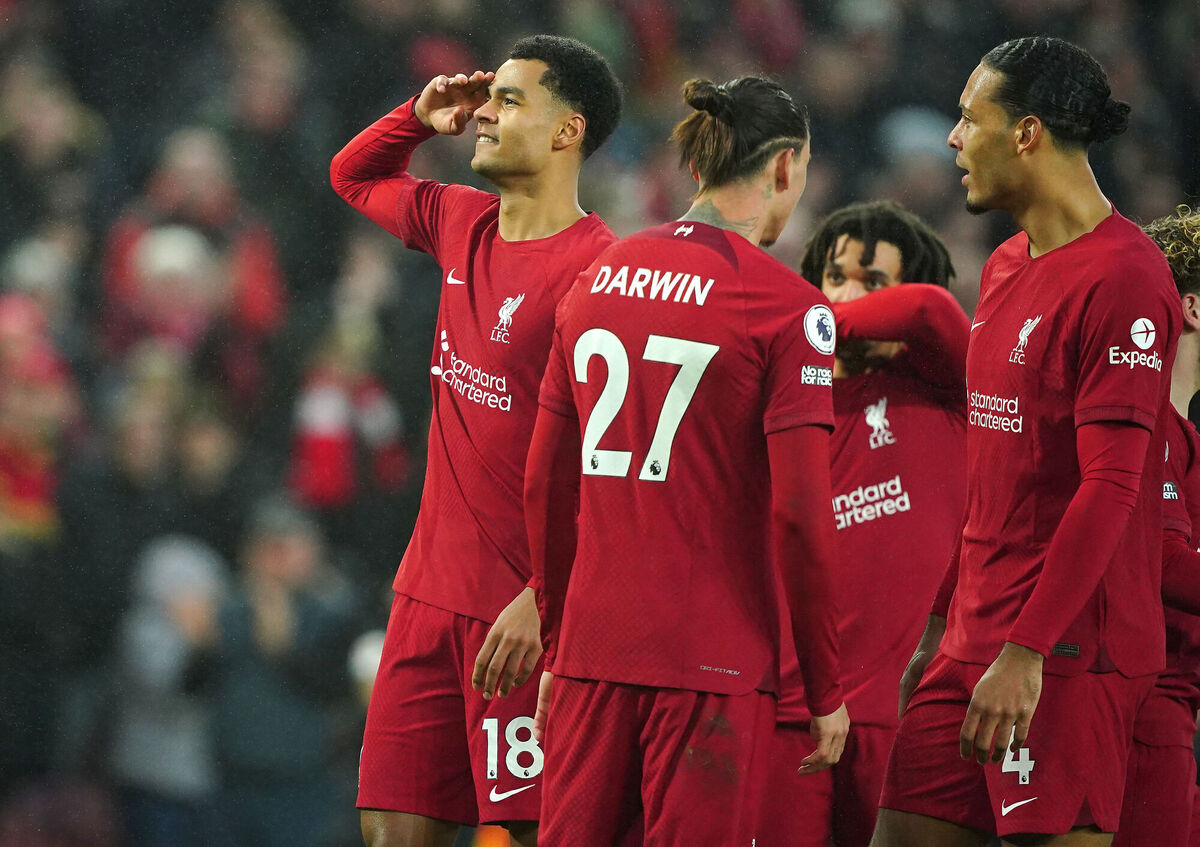 Liverpool's Cody Gakpo (left) celebrates scoring their side's third of seven goals against Man United at Anfield, Liverpool. Picture: Peter Byrne/PA Wire.