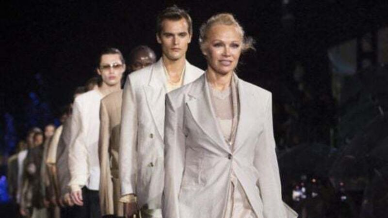Pamela Anderson and Naomi Campbell walk the Miami runway for Hugo Boss