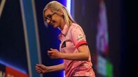 Fallon Sherrock becomes first woman to hit nine-dart finish in PDC event