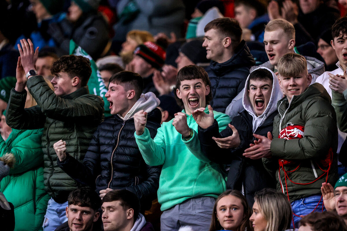 Ireland fans celebrate George Hadden’s try. Picture: INPHO/Ben Brady