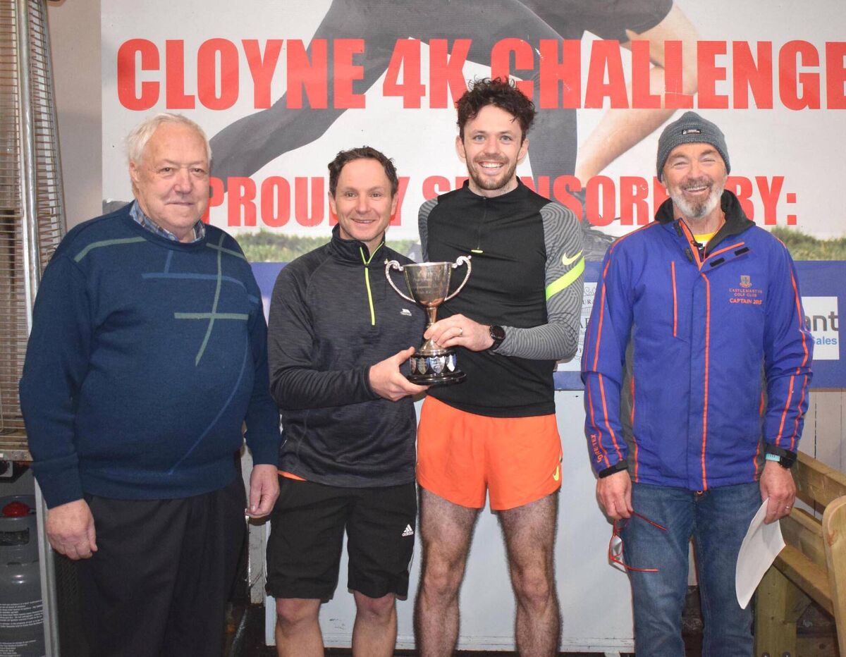 Aidan Noone of Leevale, overall winner of the Cloyne Commons Challenge 4km Series, receiving the Perpetual Cup from Ed Griffin of sponsors Dent Devil. Also included are Eddie Harty, Harty's Bar & Restaurant (sponsors), and Tommy Hartnett, Chairman of Cloyne District Community Council. Picture: John Walshe Aidan Noone of Leevale, overall winner of the Cloyne Commons Challenge 4km Series, receiving the Perpetual Cup from Ed Griffin of sponsors Dent Devil. Also included are Eddie Harty, Harty's Bar & Restaurant (sponsors), and Tommy Hartnett, Chairman of Cloyne District Community Council. Picture: John Walshe