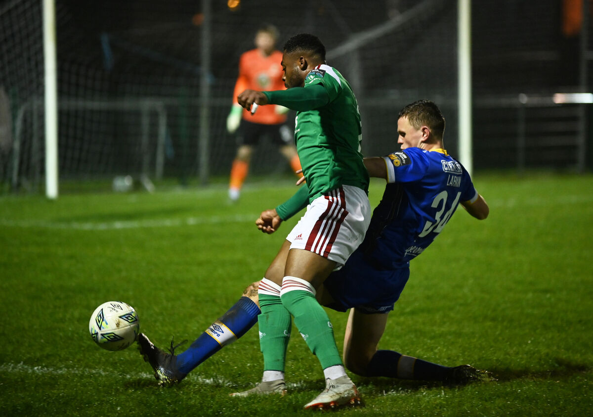 Cork City's Tunde Owolabi is tackled by Waterford's Dean Larkin. Picture: Eddie O'Hare
