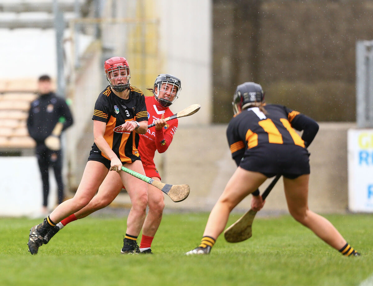 Amy O’Connor shoots at the goal under pressure from Kilkenny’s Grace Walsh. Picture: INPHO/Ken Sutton