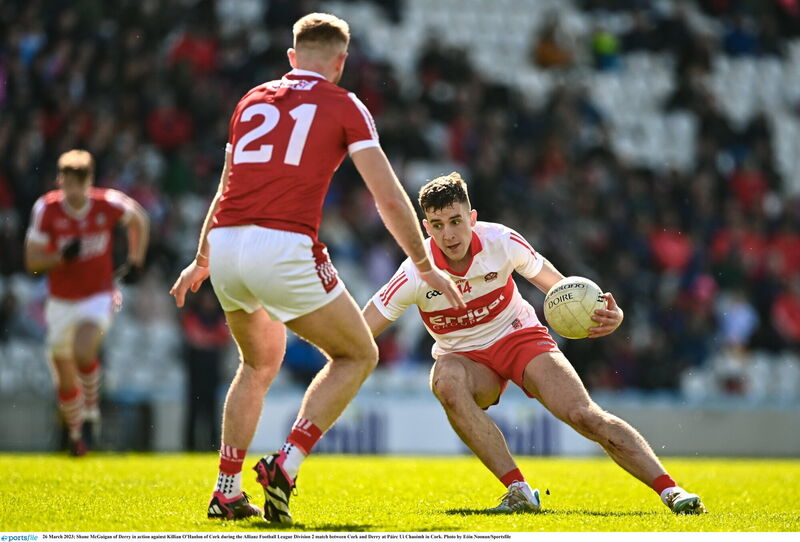 Shane McGuigan of Derry in action against Killian O’Hanlon of Cork. Picture: Eóin Noonan/Sportsfile