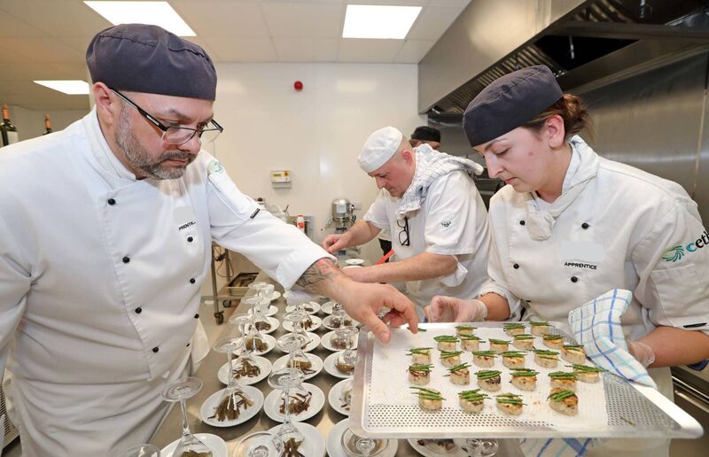 Commis chefs at the centre. Commis chefs at the centre.