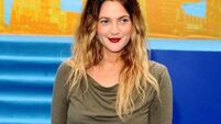 As Drew Barrymore has ‘first perimenopause hot flash’ on TV: What are hot flushes and how can you manage them?