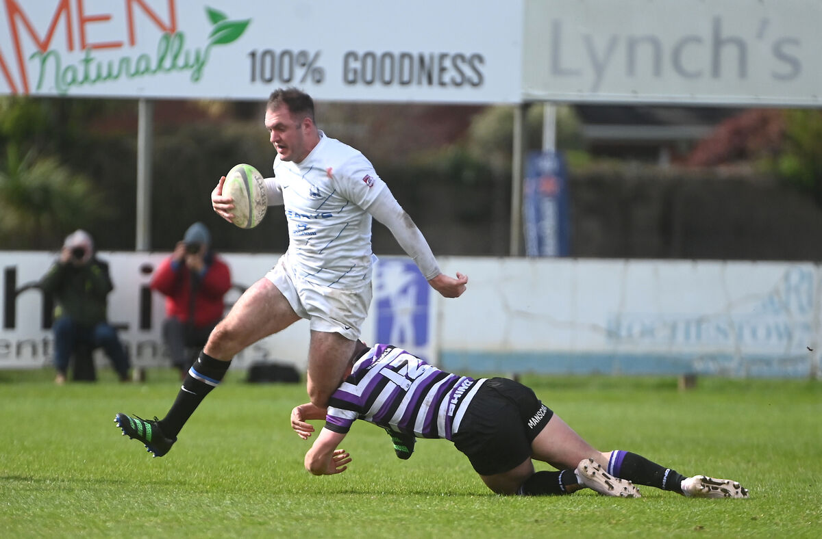  Niall Kenneally, Cork Con, gets past a challenge from Peter Sylvester of Terenure. Picture: Larry Cummins. 