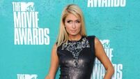 Paris Hilton shares pictures of newborn son