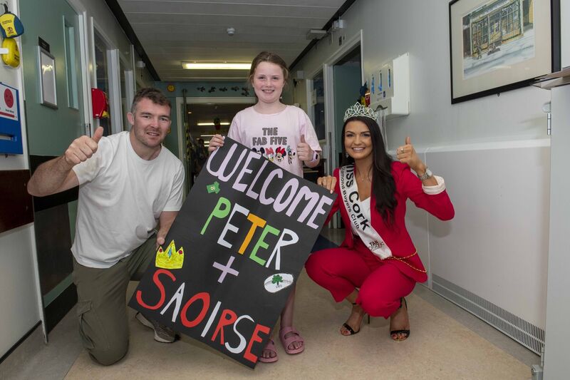 One of the highlights of the past year, for Miss Cork Saoirse O'Shaughnessy was visiting CUH with rugby star Peter O'Mahony. They met children's Puffin Ward to celebrate the granting of planning permission for the new Children's Hospital. Here Amy O'Connor (9) from Killarney gives a big welcome to Peter and Saoirse. Picture: Brian Lougheed