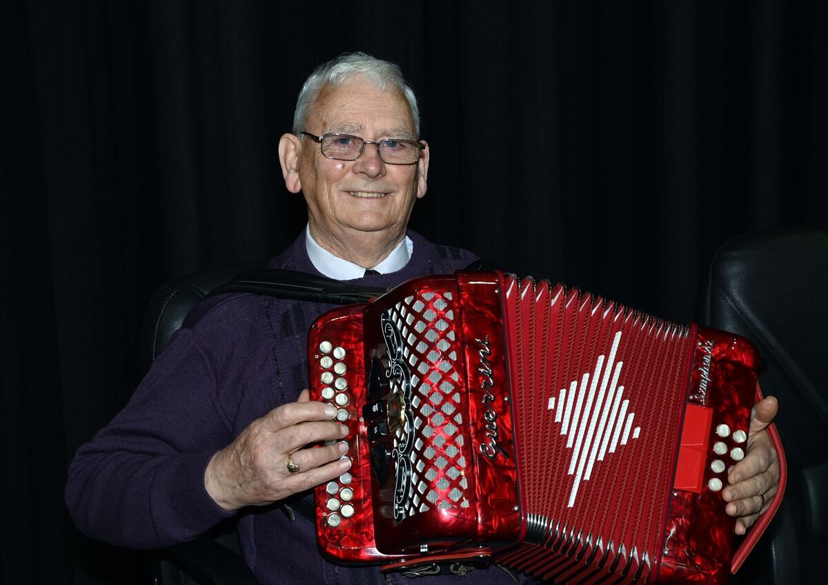 Michael Dineen playing the accordian at the Friendly Call Cork tea party at City Hall. Picture Denis Minihane. Michael Dineen playing the accordian at the Friendly Call Cork tea party at City Hall. Picture Denis Minihane.