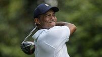 Tiger Woods labours in Masters first round as Jon Rahm stages stunning fightback