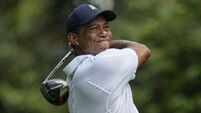 Tiger Woods struggles to opening 74 to lie nine shots off Masters lead