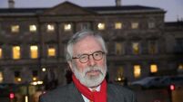 Gerry Adams rejects suggestion by Tánaiste that Sinn Féin has over glorified violence in the North