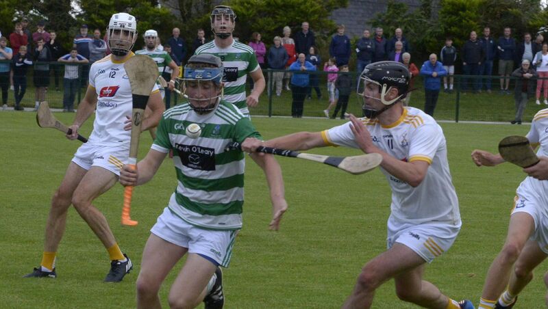 Valley Rovers player Brian McCarthy being challenged by Darrren Crowley during last year's Cork County PIHC game against Bandon. Picture Denis Boyle