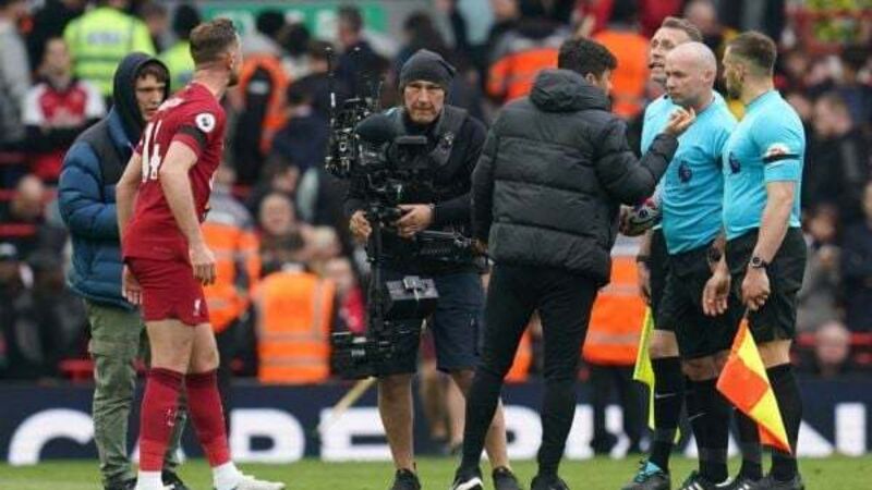 Andy Robertson branded ‘a big baby’ after clash with linesman at Anfield Andy Robertson branded ‘a big baby’ after clash with linesman at Anfield