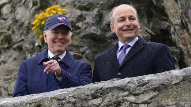 Joe Biden cheered by well-wishers waiting in the rain in Carlingford