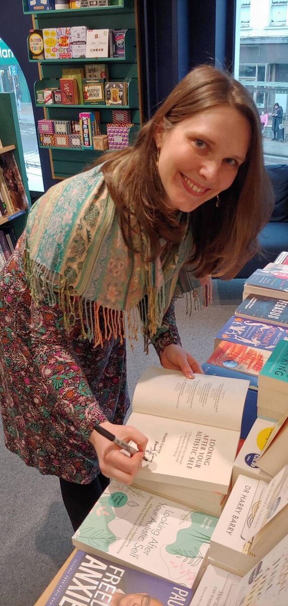 Niamh signing copies of her book in Dubray bookstore in Cork city.