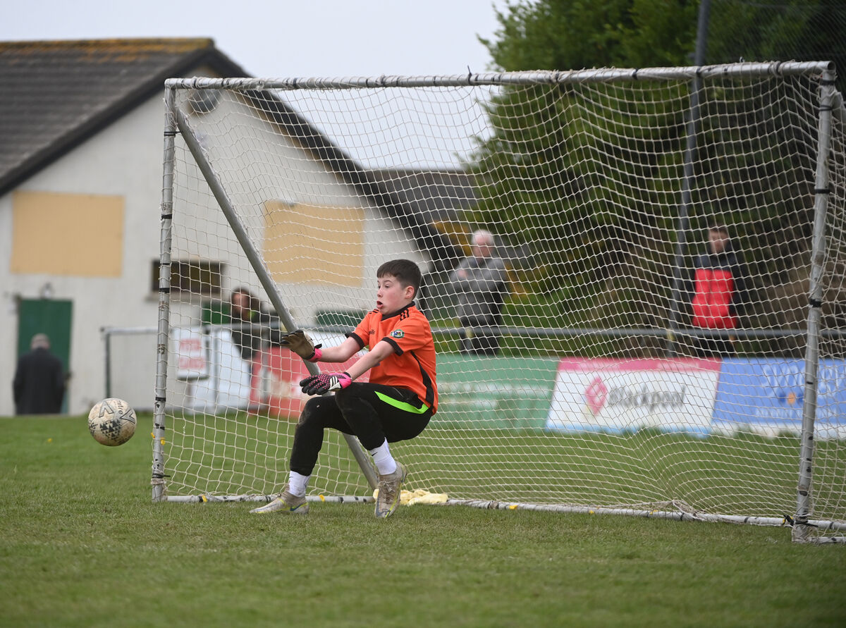 Rockmount goalkeeper Finlay O'Riordan makes a save in the penalty shoot-out. ECHO SPORT: SFAI Subway U12 National Trophy: Rockmount v Ballymackey, at Rockmount Park. Match report by Conor Daly Pic: Larry Cummins Rockmount goalkeeper Finlay O'Riordan makes a save in the penalty shoot-out. ECHO SPORT: SFAI Subway U12 National Trophy: Rockmount v Ballymackey, at Rockmount Park. Match report by Conor Daly Pic: Larry Cummins