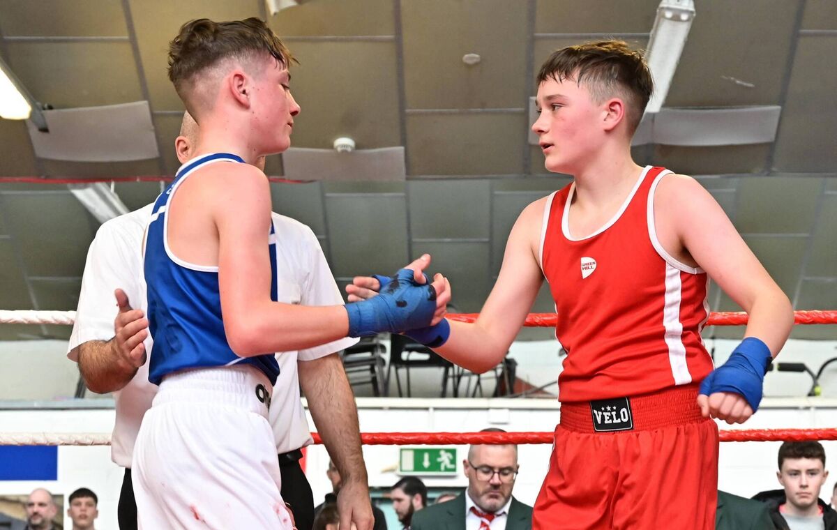 Cork County Boxing Championships, BG 1-3 —Niall Driscoll of Muskerry BC (in red) &amp; Daniel Walsh of St Colmans BC show mutual respect following their exciting Boy 3 54kg final at the County Boxing Championships held at Northside BC in Blackpool. Picture: Doug Minihane