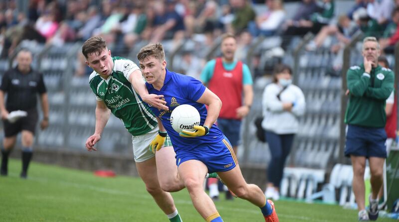 Dylan Quinn, St Finbarrs, tries to shake out a challenge from Luke Fahy, Ballincollig, in the 2022 championship.